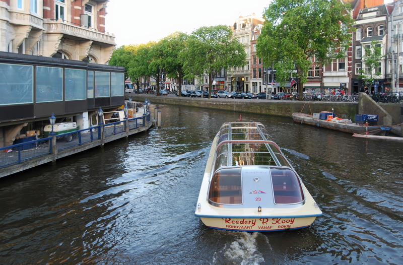 5 - A Rederij P. Kooij sightseeing boat cruising through the canals of Amsterdam